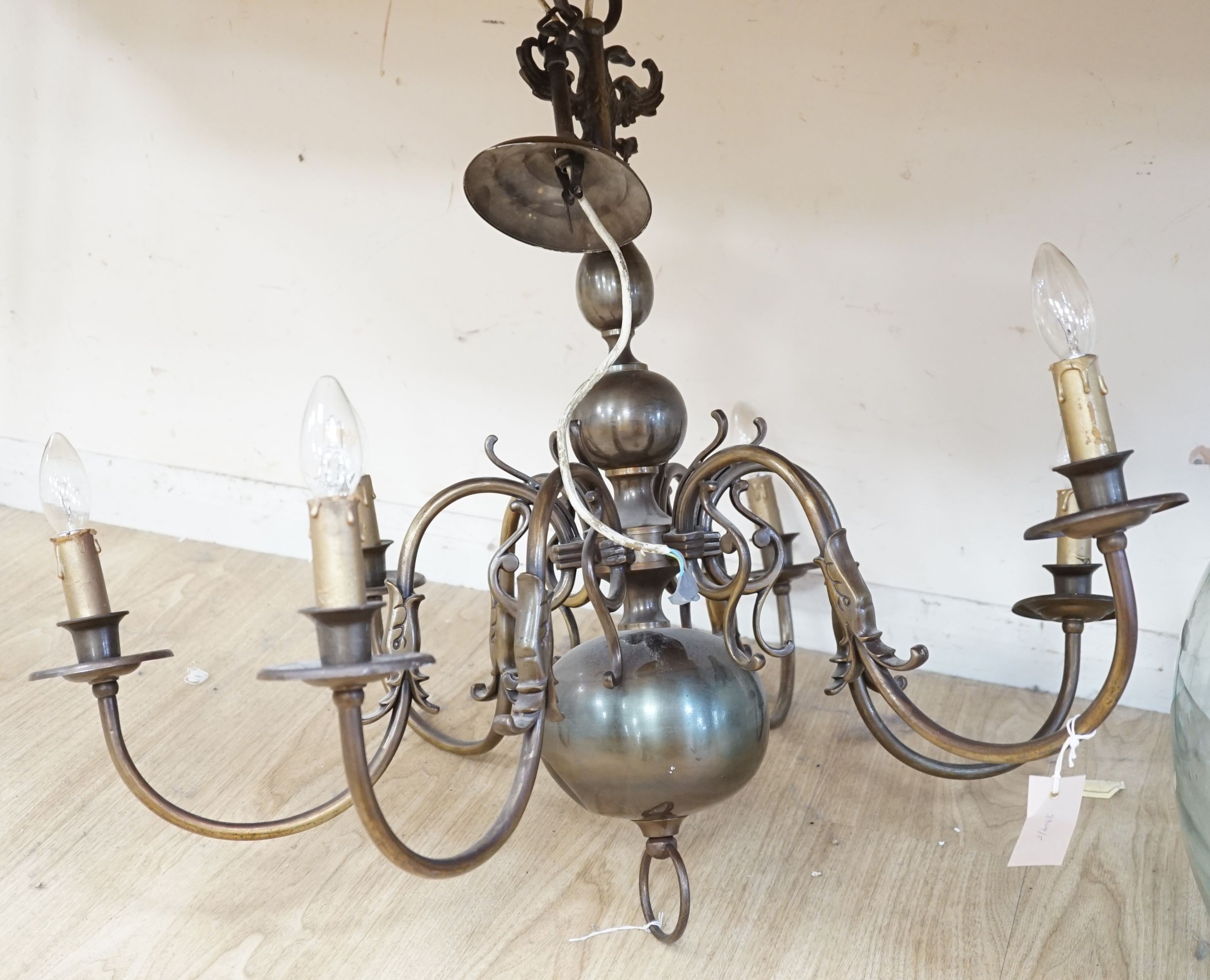 A six light brass Dutch style electrolier, 75 cms high.